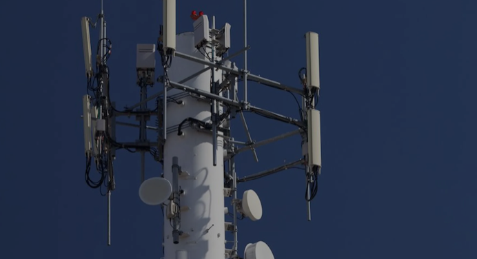 A cell tower illustrating the word telecom.